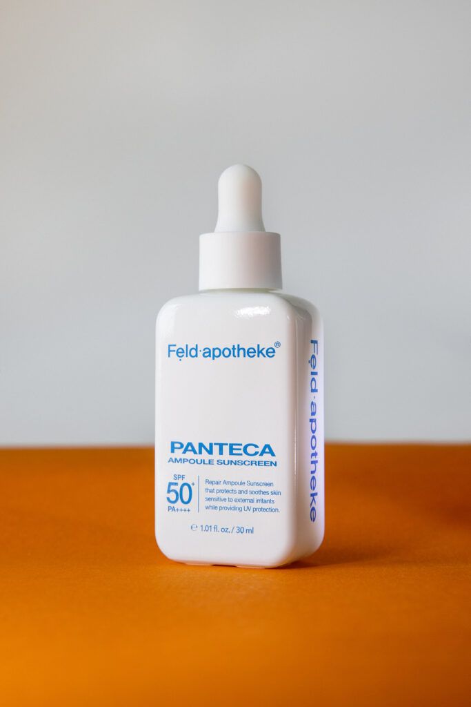 Успокаивающая солнцезащитная сыворотка  FELD APOTHEKE Dexpanthenol + Madeca Damage Care Panteca Ampoule Sunscreen SPF50+ PA++++ 30ml